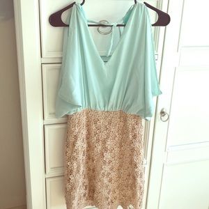 Turquoise and cream dress